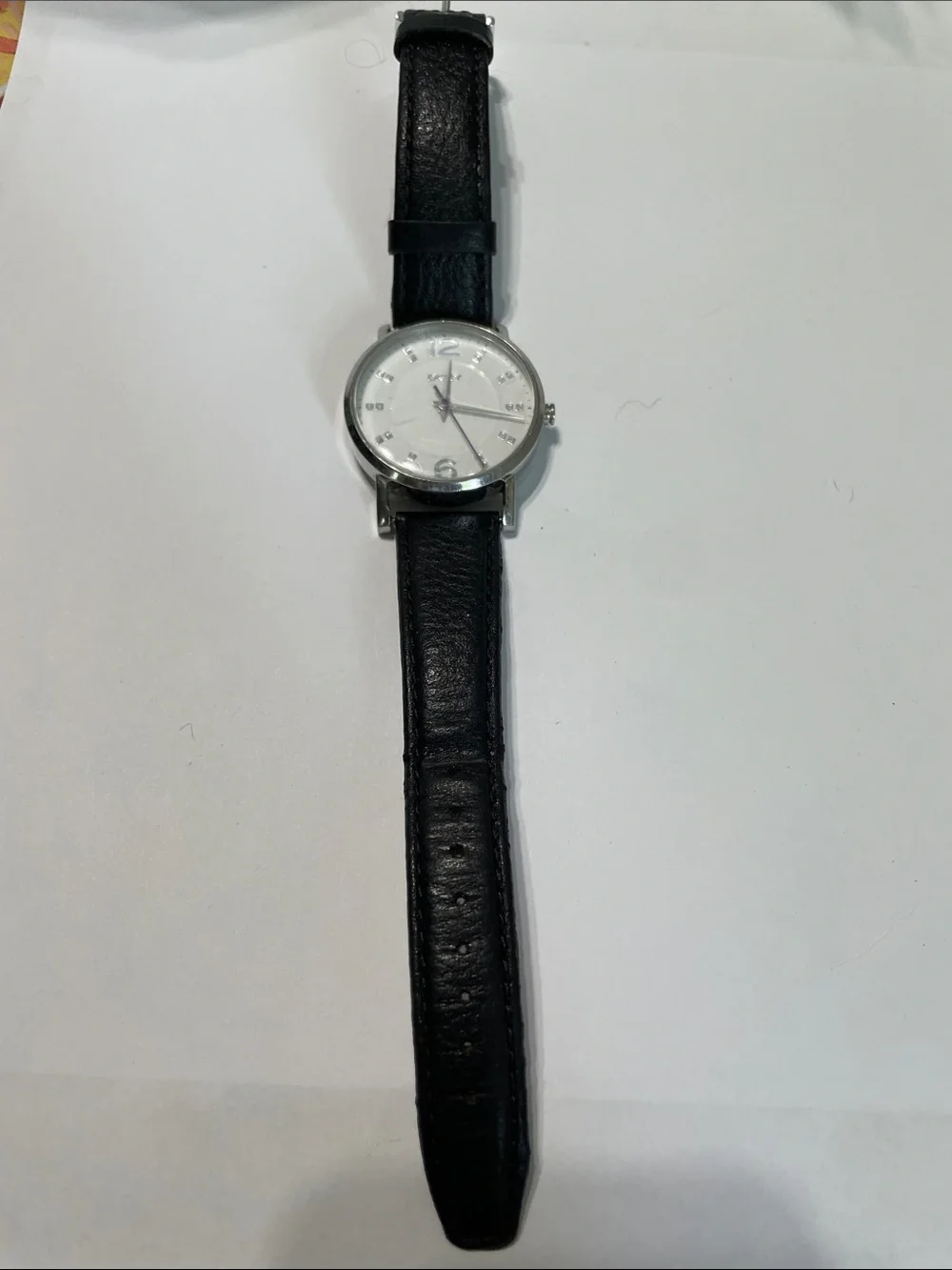 Works.  DKNY Watch.  White Face Dial, Black Leather Strap. eBay -$33
